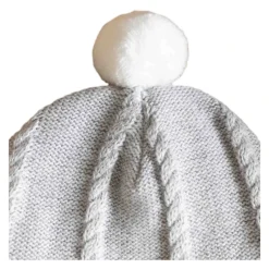 Bonnet en maille avec pompon et cache-oreilles