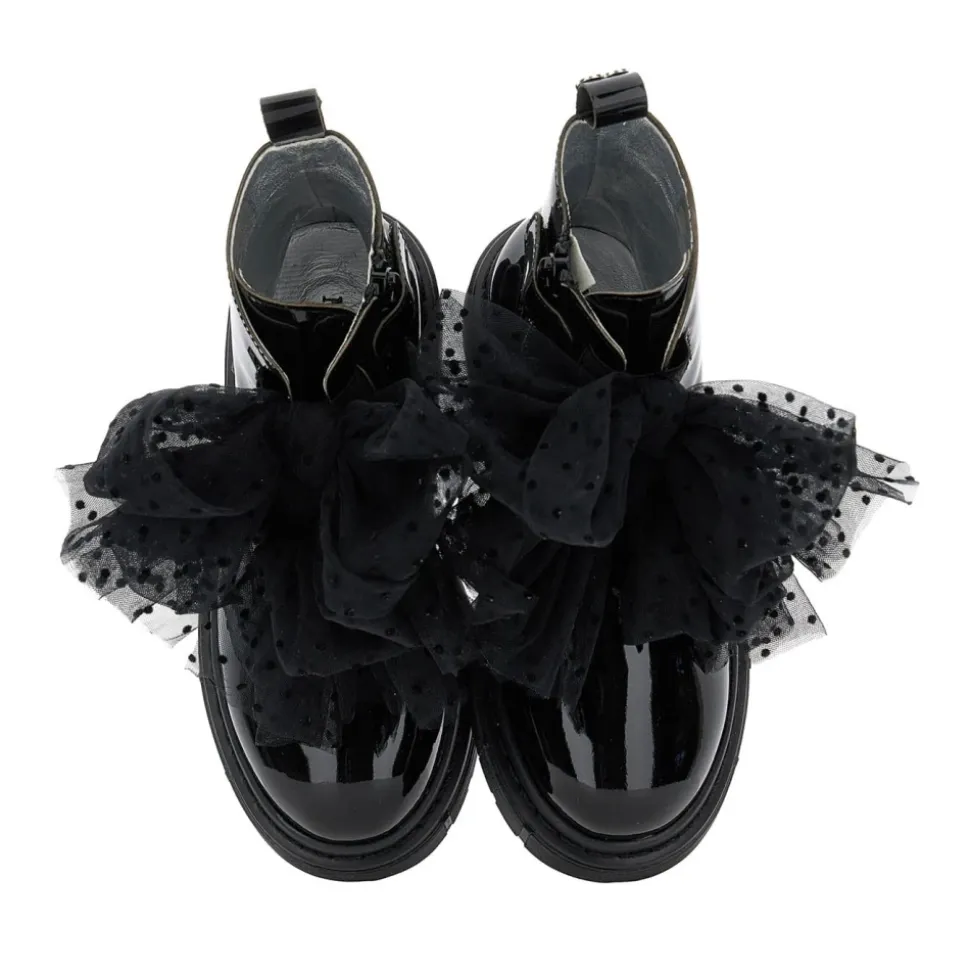 Bottines à brides en cuir verni
