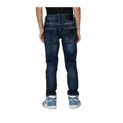 Jean en Denim avec Badge Violet