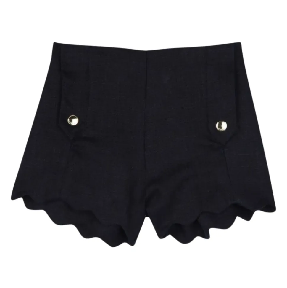 Shorts en lin à bords festonnés