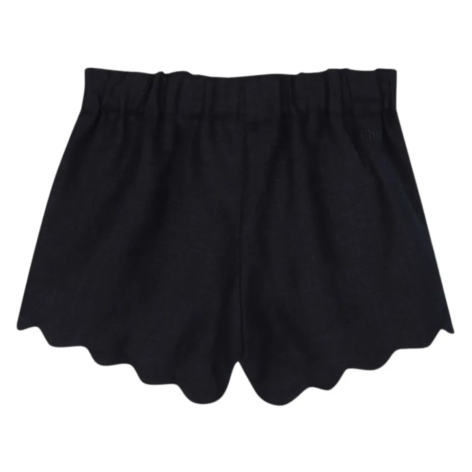 Shorts en lin à bords festonnés